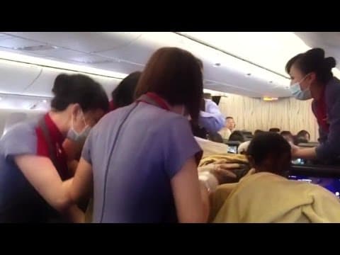 Thumbnail for Baby girl born mid-flight at 30,000 feet