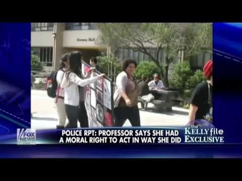 Thumbnail for Feminist Bigfoot caught on video assaulting pro-life females, stealing & destroying sign