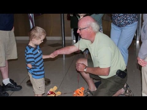 Thumbnail for Adopted Boy with One Hand Bonds with New Grandpa Over Shared Condition