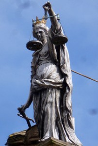 Scales of Justice in Bath, England. Photo credit: m.gifford on Flickr