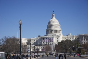 The Capitol, decorated with flags for the 2013 Inauguration Ceremony.  Photo Credit: Heidi Miller