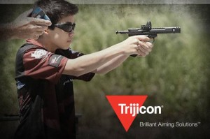 Trijicon sponsored junior shooter Greyson Lee runs the RMR during the Oklahoma State Ruger Rimfire match.