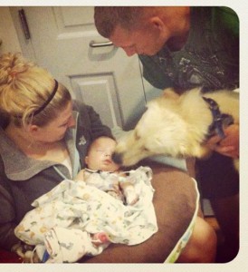 Baby Corbin meets his dog Zeus.