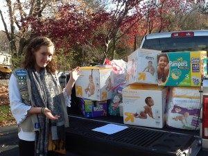Hannah Sheboy with her donated items for Birth Right. 