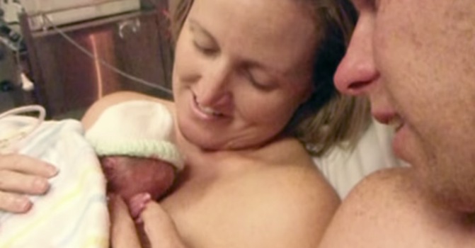 Kate and David Ogg hold baby Jamie.