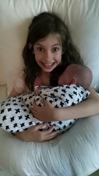 Benson's big sister is overcome with joy that he is finally home after being born premature.