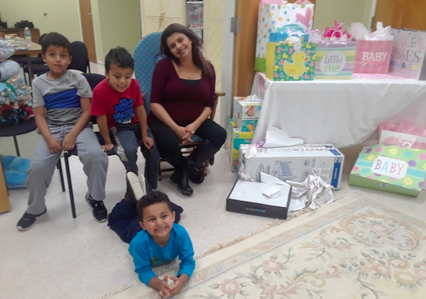 Samantha and her three sons, at her baby shower after a successful abortion pill reversal