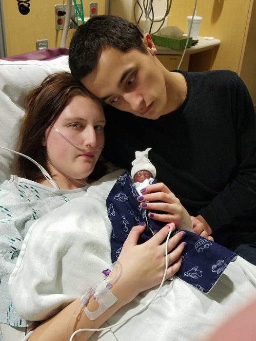 Zane is pictured with his parents Kaden and Shelby after being born at just 19 weeks gestation.