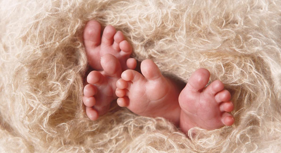 Newborn Twins’ Feet