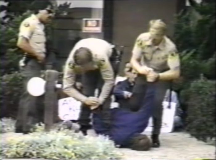 Image: Brutal Truth documentary police bend pro-life rescuer's limbs as he cries out in pain 2