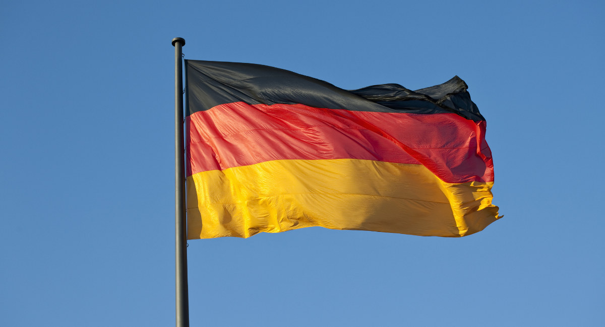 A German flag on a flag pole