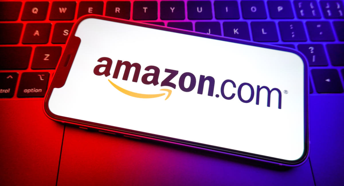 In this photo illustration, an Amazon.com logo is displayed