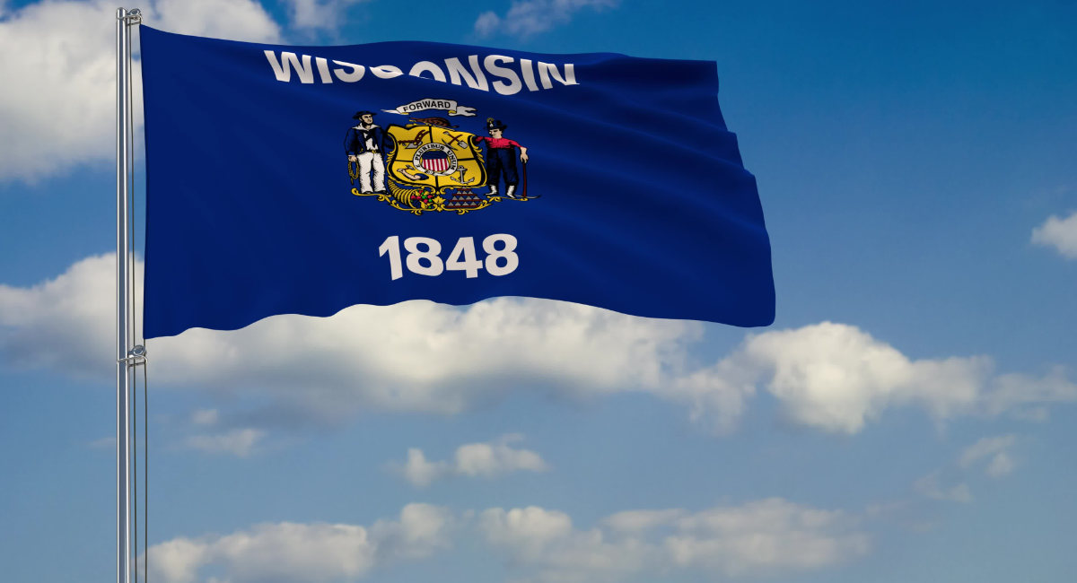 Flag of Wisconsin – US state fluttering in the wind against a cloudy sky 3d rendering