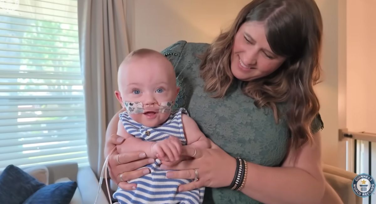 Preemie Nash Keen held by his mother.